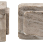 Two light brown marble bookends with variation throughout.
